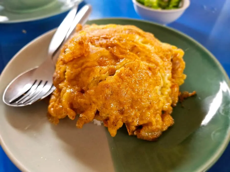A fluffy Thai omelette over rice